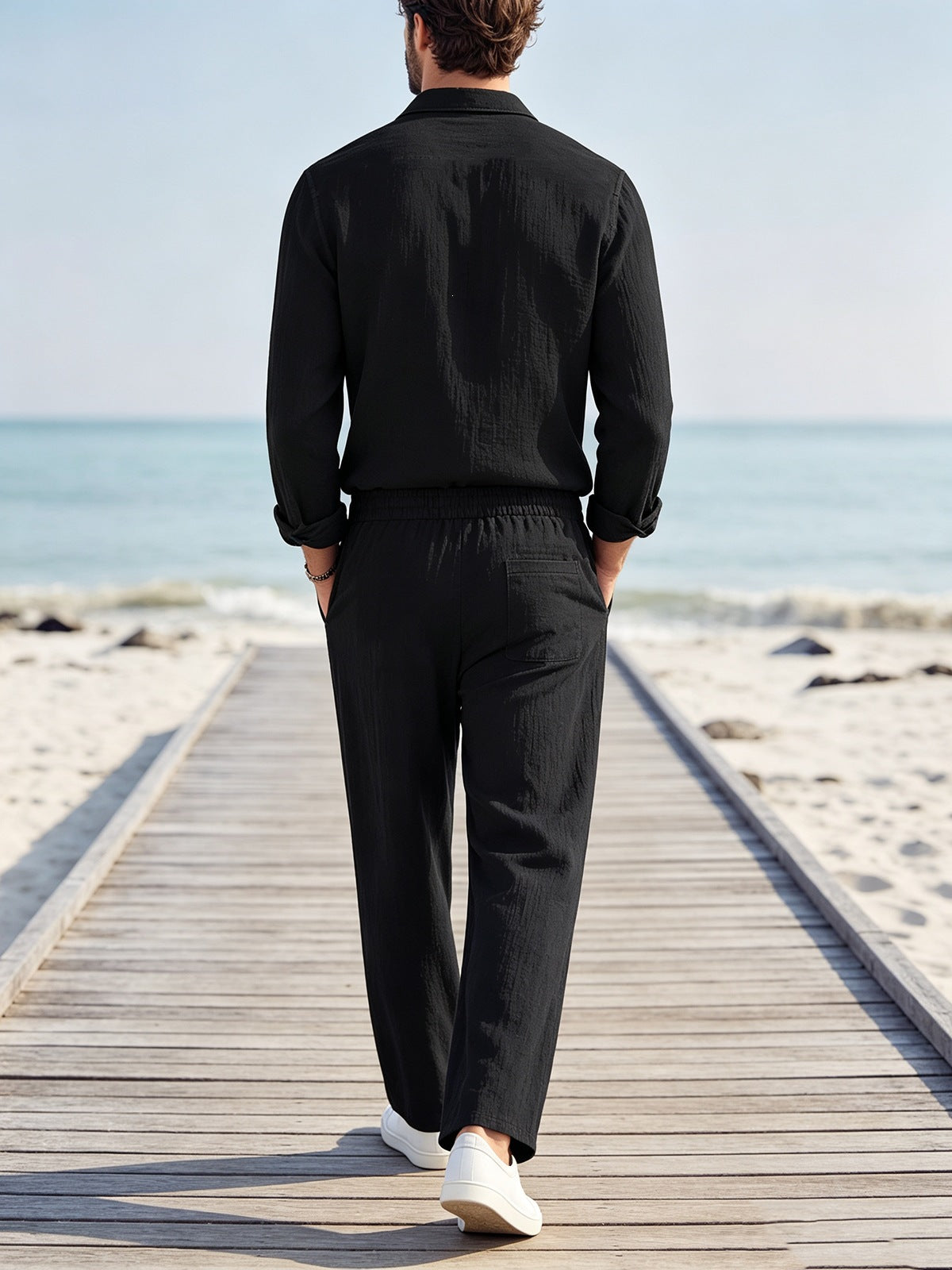 Back view of men's loose linen pants and shirt set
